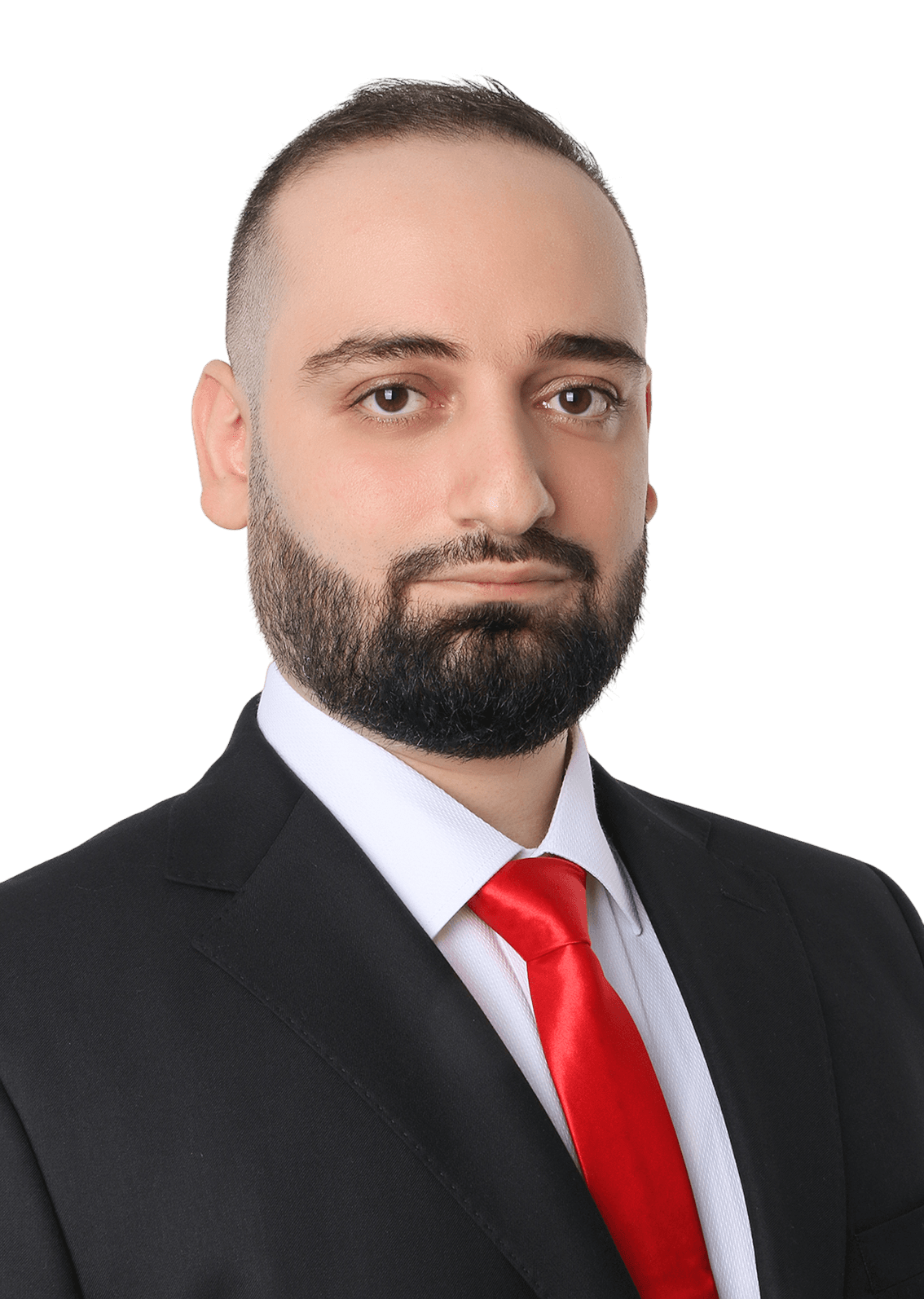 Hassan Mdawar, in a dark suit with a white shirt and red tie